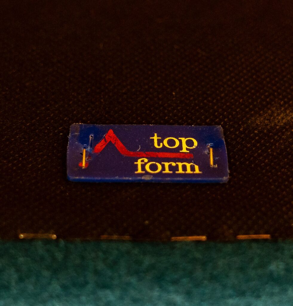 76211